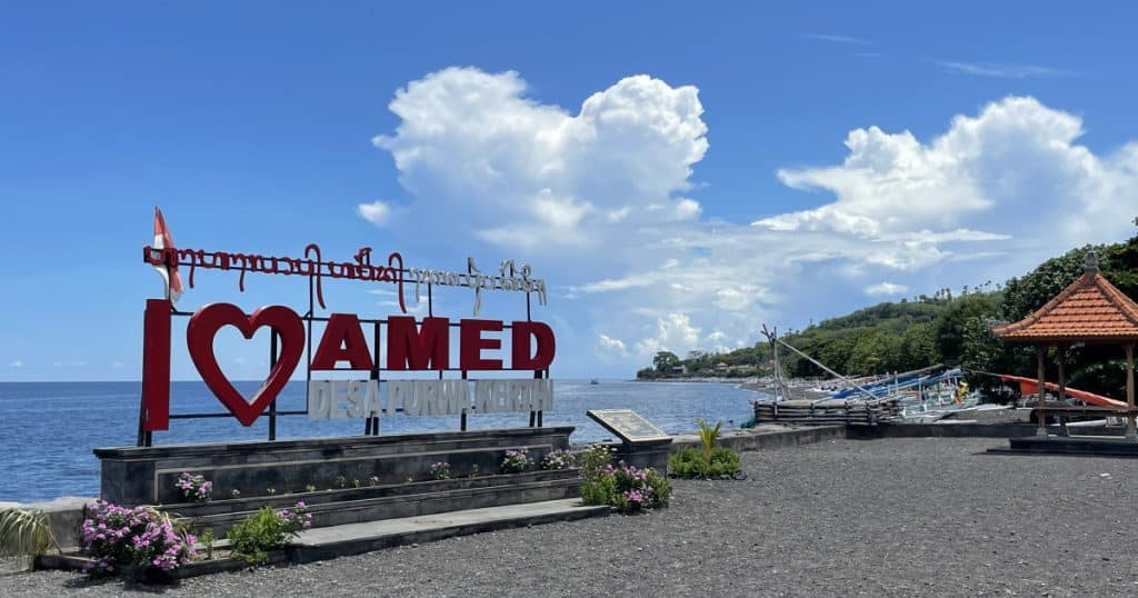 I Love Amed sign on the beach of Amed Bay